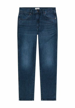 Jeans azul escuro feitos de denim, com um design de perna reta, cinco bolsos e costura em contraste. Fecho com botões e zíper na cintura.