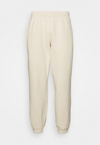 adidas Originals ESS PANTS - Tracksuit bottoms - white
