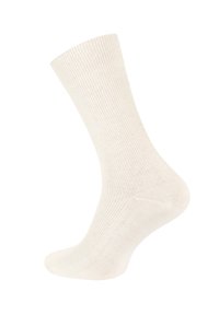 Calza alla caviglia beige a coste realizzata in tessuto morbido, con punta e tallone rinforzati, una consistenza liscia e cuciture uniformi.