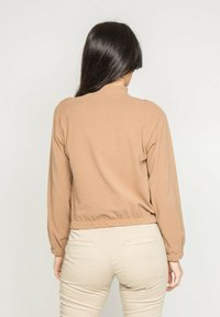 Dona x Lisa Sweat polaire - beige