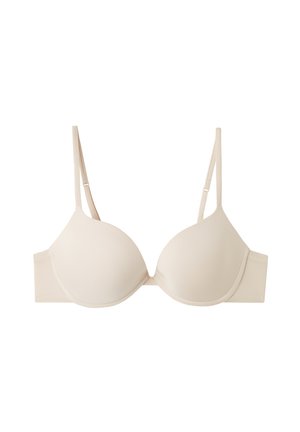 Soutien-gorge beige clair avec des bonnets lisses et moulés et des bretelles réglables. Présente un design simple sans motifs ni décorations.