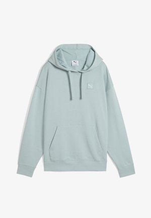 Svijetloplava dukserica od mekog materijala, s prednjim džepom, kapuljačom na k verticalnim nitenjem i malim izvezenim logotipom na grudima.