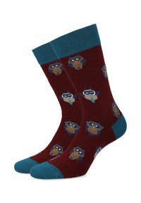 Bordowe skarpetki z turkusowymi akcentami, z powtarzającym się wzorem sowy w odcieniach niebieskiego i brązowego, z paskowanymi detalami na ciałach sów.