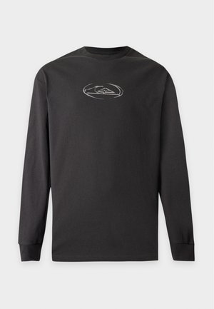 T-shirt noir à manches longues avec col rond et petit motif circulaire abstrait blanc centré sur la poitrine.