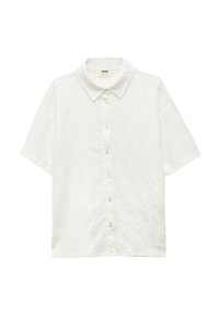 Camisa de manga corta blanca con un patrón texturizado de diamantes, cierre de botones y cuello clásico. Confeccionada en un material de algodón ligero.