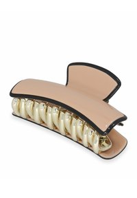 Gran pinza para el cabello hecha de plástico rosa brillante con acentos negros. Presenta una fila de dientes interconectados blancos para un agarre seguro.