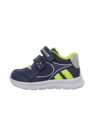 Navy and neon green toddler sneaker with two Velcro straps, white sole, and reflective patch on the heel.