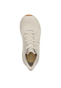 Beige athletic shoe with a mesh upper, lace closure, and padded collar. Features a cushioned insole and a textured rubber outsole.