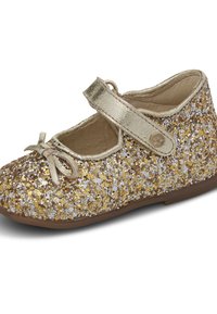 Błyszczące buty Mary Jane z mieniącym się w kolorach złotym, srebrnym i białym wierzchem oraz dopasowanym metalicznym paskiem i detalem w postaci kokardy. Brązowa podeszwa.