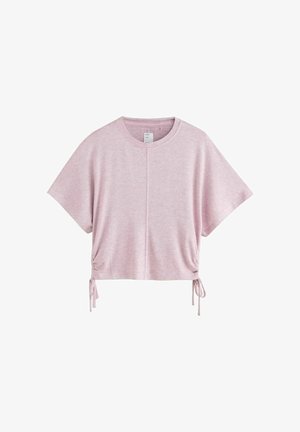 Roza kratka majica iz mehkega, teksturiranega blaga. Ima kratke rokave, okrogel izrez in nastavljive trakove na straneh.