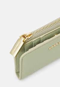 Coccinelle Portefeuille - celadon green