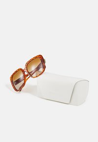 Michael Kors MALLORCA - Aurinkolasit - amber heritage