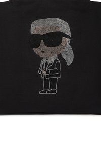 Black tote bag featuring a crystal-studded cartoon figure in a suit and sunglasses, with silver and black detailing on the design.