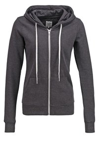 Sweat à capuche zippé gris foncé avec cordons blancs, poches avant et poignets côtelés, présenté sur un fond blanc.