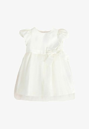 Rochie albă cu mâneci scurte bufante, corp din satin și fustă din tul. Are o fundă la talie și un guler rotund.