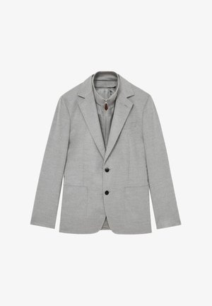 Helles graues Blazer aus strukturiertem Stoff, mit Reverskragen, zwei vorderen Taschen, drei Knöpfen und einem gepolsterten Innenfutter mit Reißverschluss.
