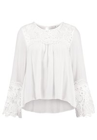 Blouse blanche à manches longues, tissu plissé, détails en dentelle sur les épaules et les poignets, encolure arrondie, coupe ample et longueur légèrement raccourcie.