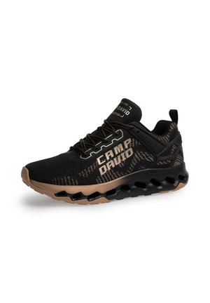 Black and brown athletic sneaker with patterned fabric, thick sole with hollow cutouts, laces, and "CAMP DAVID" branding on side and tongue.