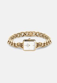Montre dorée avec un bracelet en chaîne imposante, cadran rectangulaire blanc et repères horaires simples. Équipée d'une fermeture pliable et d'une couronne.
