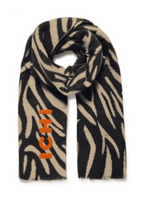 Sciarpa a fantasia zebra beige e nera con logo testuale arancione "ICHI". Texture morbida, forma rettangolare e bordi frangiati.