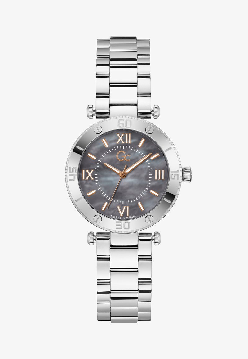 Hõbedane roostevabast terasest kell ümmarguse näo, hallist pärlmutterist kellaplaadi, Rooma numbritega markerite ja kuupäevafunktsiooniga allosas.