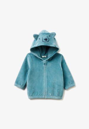 Blaue Cordjacke mit Reißverschluss und Bärenohren an der Kapuze sowie gestickten Gesichtszügen. Sie verfügt über einen strukturierten Stoff und ein weiches Innenfutter.