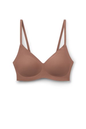 Reggiseno imbottito marrone chiaro senza cuciture con sottili spalline regolabili e finitura liscia.