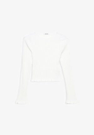 Haut blanc à manches longues côtelé avec un col rond et un ourlet à volants. Fabriqué dans un tissu doux, il présente un design ajusté et des manches fines.
