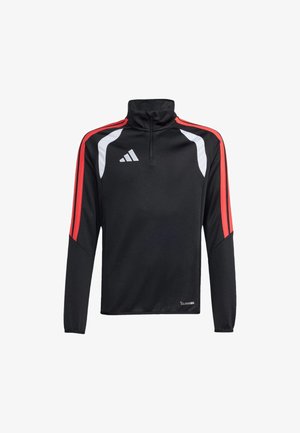 Haut de sport noir à manches longues avec des rayures rouges sur les manches, des panneaux d'accent blanc, un col à demi-fermeture éclair, et un petit logo sur la poitrine et l'ourlet.