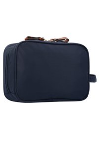 Borsa da viaggio blu navy realizzata in tessuto resistente, con forma rettangolare, dotata di maniglia superiore, chiusura con zip e maniglia laterale per un facile trasporto.