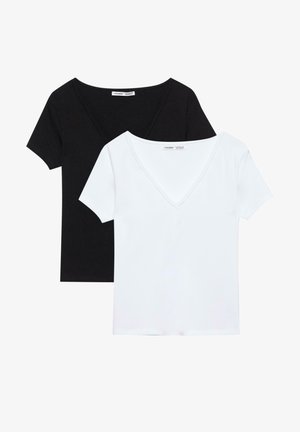 Two plain short-sleeve V-neck t-shirts, one white in front and one black behind, laid flat on a white background.