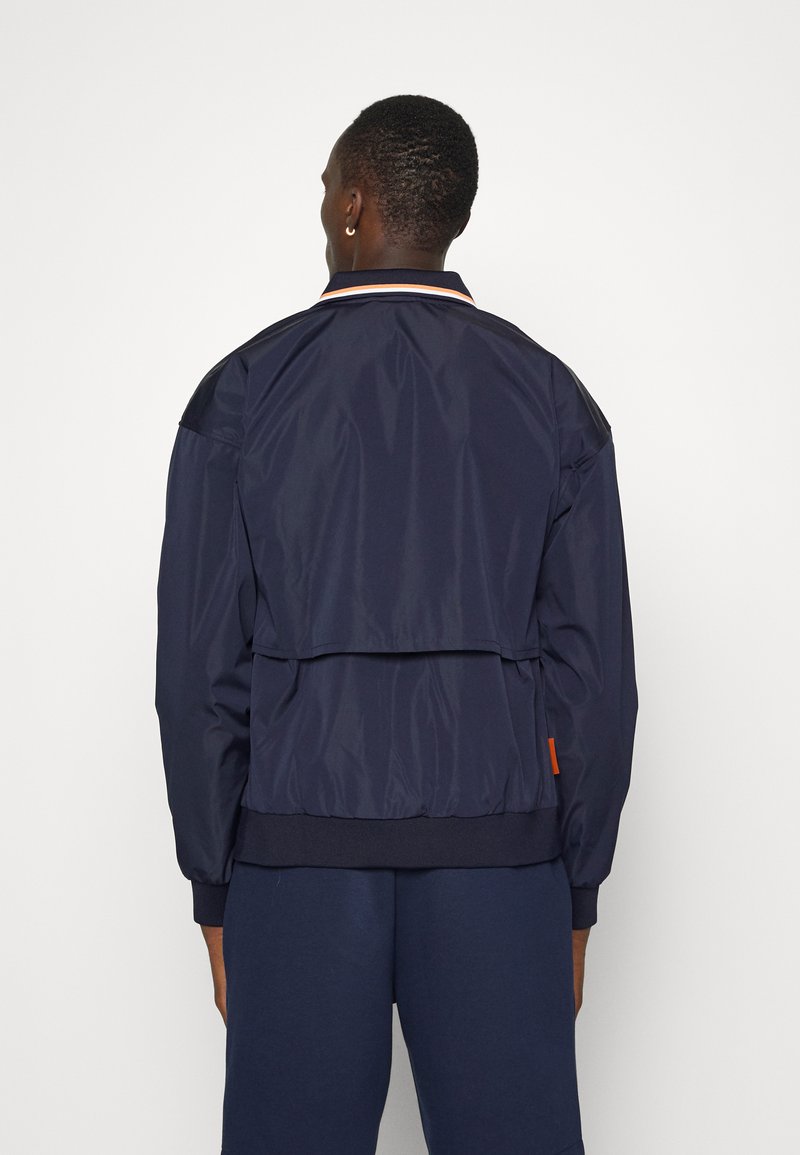 Herren Trainingsanzüge | Lacoste Sport TENNIS JACKET Trainingsjacke navy blue/white/mandarin tree orange/dunkelblau - OZ06247 Herren Trainingsanzüge | Lacoste Sport TENNIS JACKET Trainingsjacke navy blue/white/mandarin tree orange/dunkelblau - OZ06247