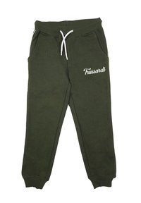 Pantaloni della tuta verdi con coulisse, tasche laterali e dettagli del logo bianco. Realizzati in tessuto morbido, presentano polsini a coste alle caviglie.