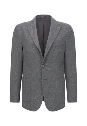 Harmaa takki, jossa on tekstuuri, taitettu kaulus, kaksi etutaskua ja kaksi nappia. Sisällä on sileä vuori.