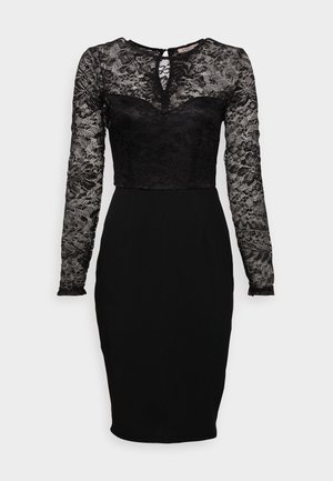 Robe noire longueur genou avec jupe ajustée, manches longues en dentelle et corsage en dentelle avec détail d'encolure en forme de trou de serrure.