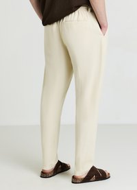 Calliope TINTA UNITA - Pantaloni - sabbia