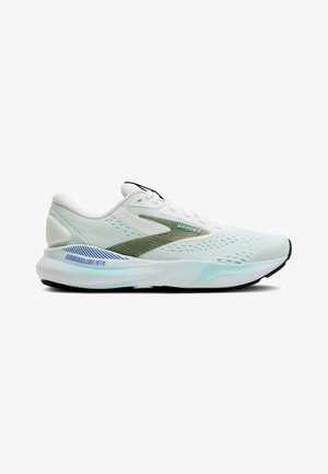 White running shoe with a lightweight mesh upper, green accents, textured detailing, and a cushioned sole. Features "Brooks" and "Adrenaline GTS" branding.
