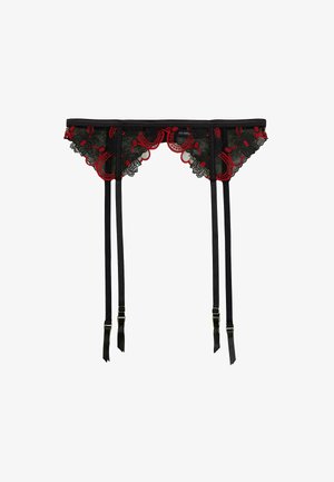 Jarretière en dentelle noire avec broderie florale rouge et quatre sangles noires réglables avec boucles métalliques sur fond blanc.