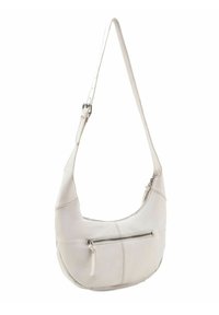 Sac à bandoulière en cuir blanc avec une forme incurvée, comportant une poche zippée à l'avant, une bandoulière ajustable et des coutures discrètes.