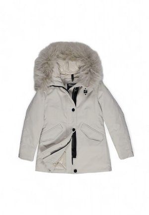 Parka leggera color beige chiaro con cappuccio foderato in pelliccia, chiusura a zip e bottoni, due tasche anteriori e interno trapuntato. Dettagli con zip nera.