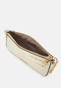 Gold faux leather clutch with crocodile pattern, zip closure, and gold-tone hardware; interior is brown with a logo-embossed label.