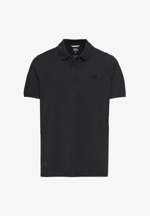 Polo noir en coton, avec un col à trois boutons, des manches courtes et un petit logo de la marque sur la poitrine gauche.