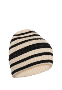 Bonnet en tricot avec des rayures horizontales noires et crème, présentant une texture douce et un design arrondi, adapté pour être porté par temps froid.