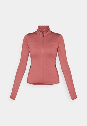 Langärmlige, Reißverschluss-Jacke in rosafarbenem Pink mit strukturiertem Stoff, ausgestattet mit zwei Seitentaschen und einem hohen Kragen.
