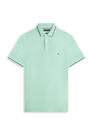 Πράσινο πουκάμισο πόλο μέντας με γιακά, τρία κουμπιά και ρίγες στα μανίκια. Διαθέτει μικρό λογότυπο στο στήθος.