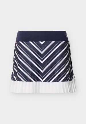 Falda azul marino y blanca con rayas en forma de cheurón en la parte superior y un dobladillo plisado blanco en la parte inferior.