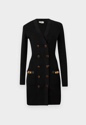 Black knitted cardigan with a fitted shape, double-breasted gold-button closure, and two front pockets with leather accents.