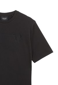T-shirt in cotone nero con scollo rotondo e maniche corte, decorato con un design di aquila in rilievo sulla parte sinistra del petto.