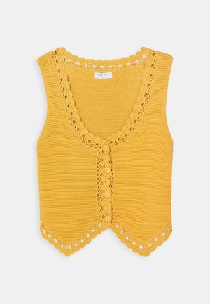 Chaleco sin mangas amarillo de punto con bordes festoneados, ribete con estampado floral y dos botones delanteros.