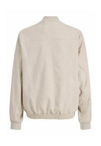 Veste beige à manches longues avec poignets côtelés, ourlet élastiqué et petit col montant, vue de dos sur fond blanc.